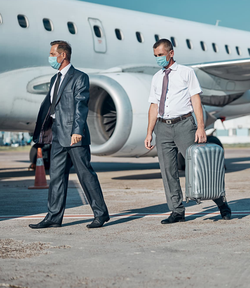 A Professional Chauffeur Standing Ready for a Corporate Event