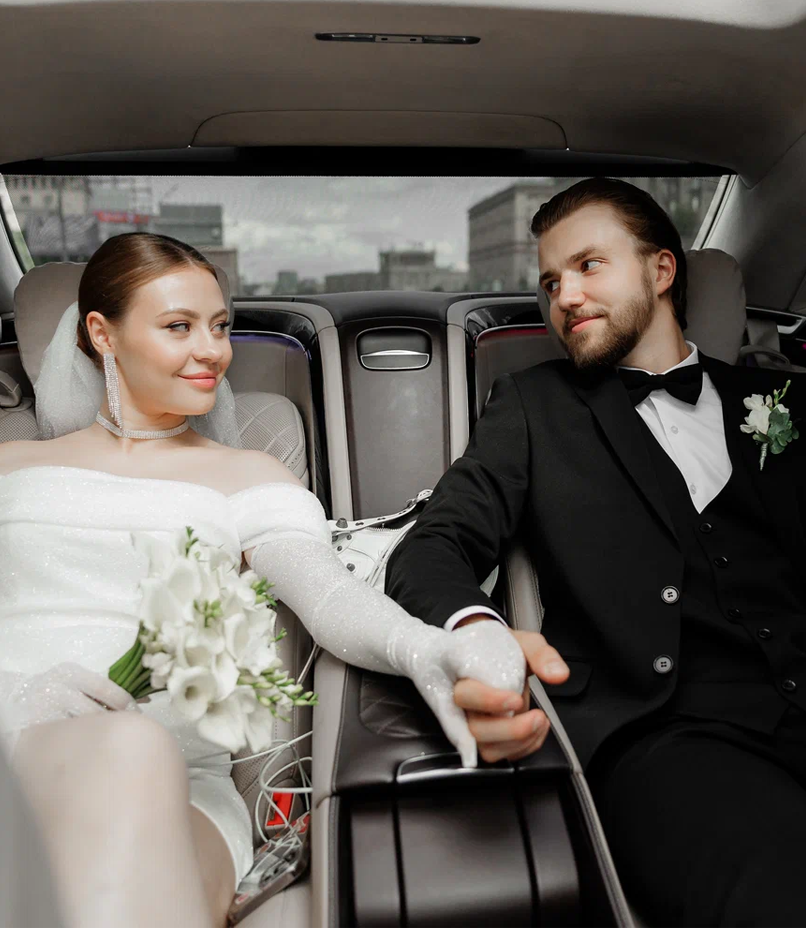 Elite Limo Wedding Chauffeur Standing Ready